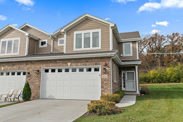 view of front facade featuring a garage and a front lawn