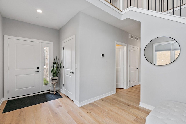 foyer entrance featuring light wood-type flooring