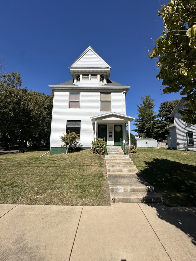 view of front of property with a front yard