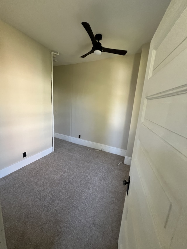 unfurnished room with carpet and ceiling fan