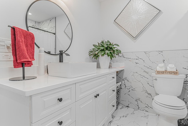 bathroom with walk in shower, vanity, tile walls, and toilet