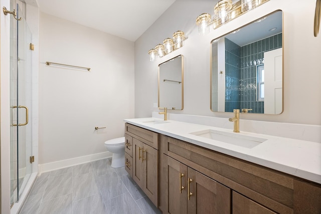 bathroom with vanity, toilet, and walk in shower