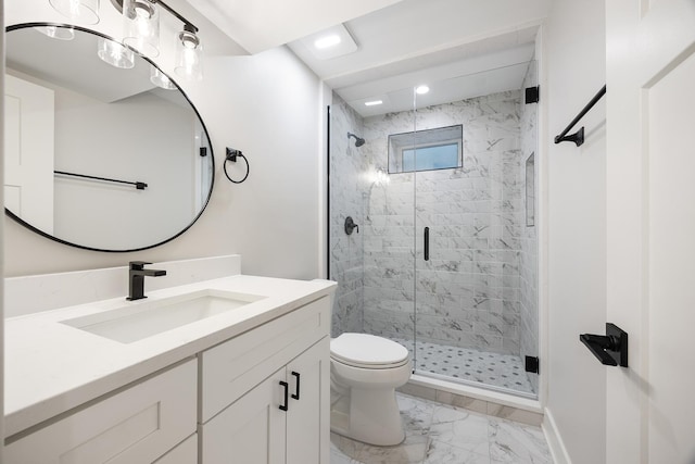 bathroom featuring walk in shower, vanity, and toilet