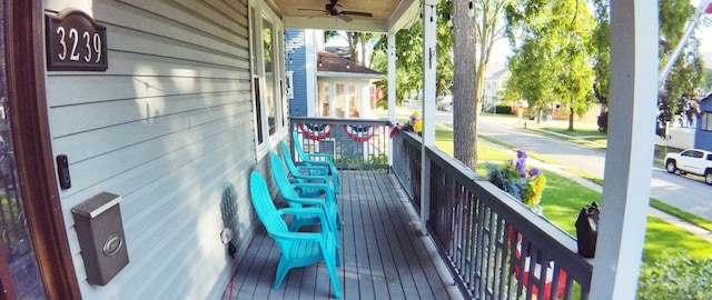 deck featuring ceiling fan and covered porch