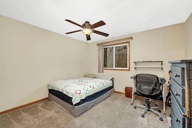 bedroom with ceiling fan and light colored carpet