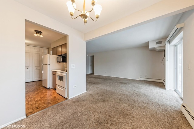 interior space featuring an inviting chandelier, light colored carpet, white appliances, and a baseboard radiator