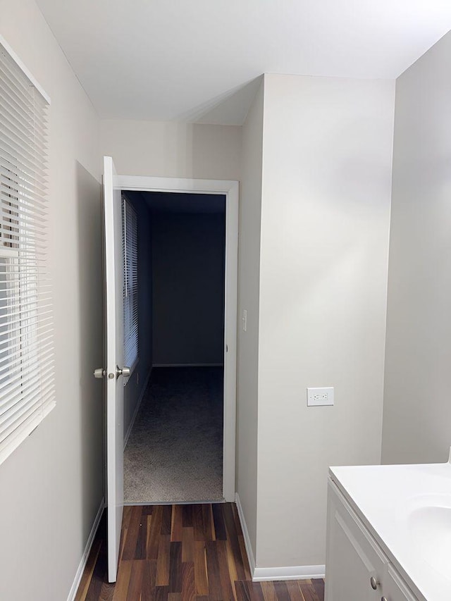 hall featuring dark hardwood / wood-style floors