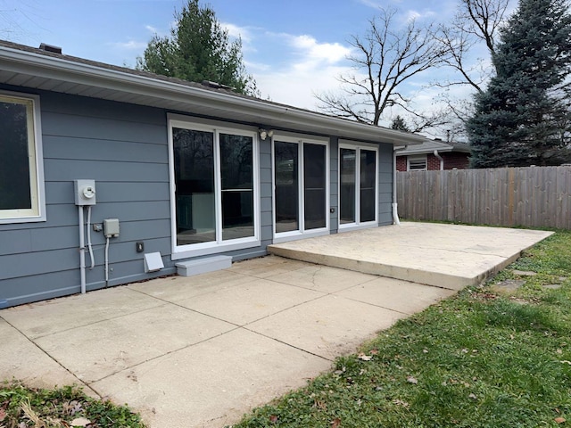 back of property with a patio area