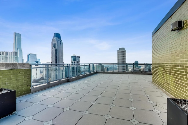 view of patio / terrace featuring a wall mounted air conditioner