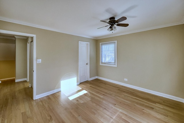 unfurnished bedroom featuring ceiling fan, light hardwood / wood-style flooring, and ornamental molding