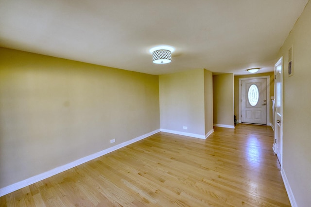 entrance foyer with light hardwood / wood-style floors