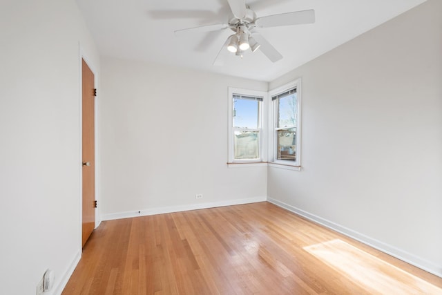 unfurnished room featuring ceiling fan and light hardwood / wood-style floors