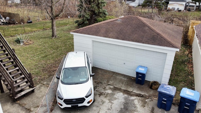 garage with a lawn