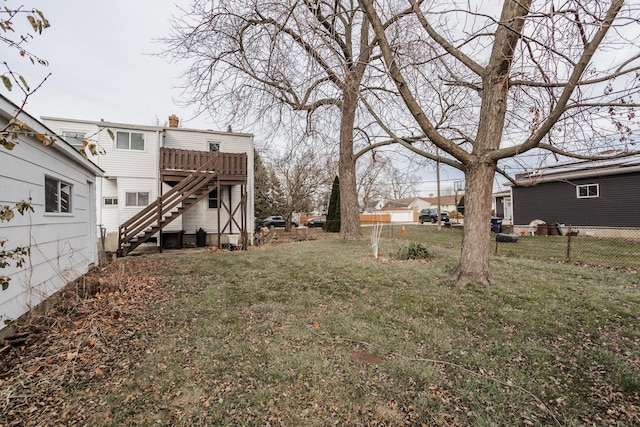 view of yard with a wooden deck