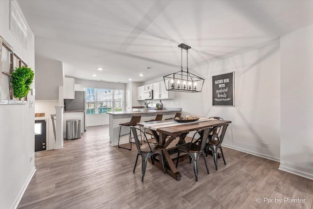 dining area featuring light hardwood / wood-style floors