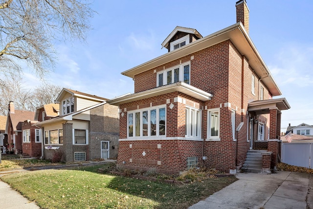 view of front facade featuring a front yard