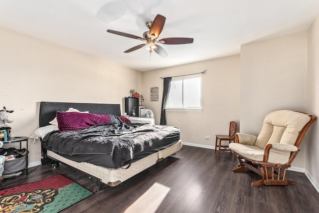 bedroom featuring ceiling fan and dark hardwood / wood-style floors