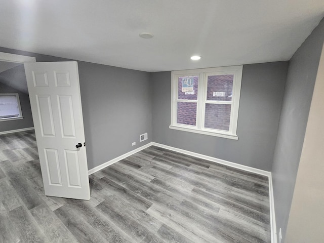 empty room with light hardwood / wood-style floors