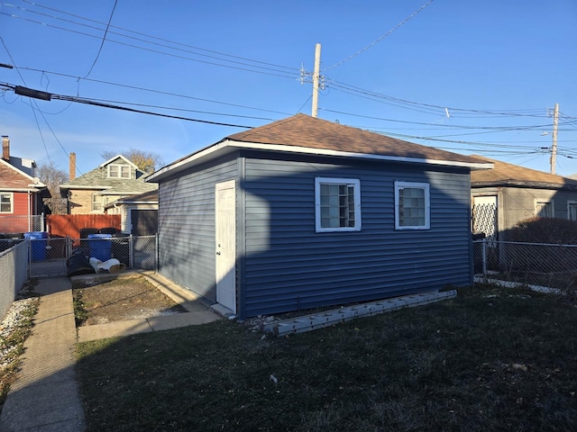 view of property exterior featuring a lawn