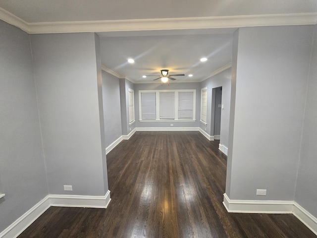 unfurnished room with dark hardwood / wood-style flooring, ceiling fan, and crown molding