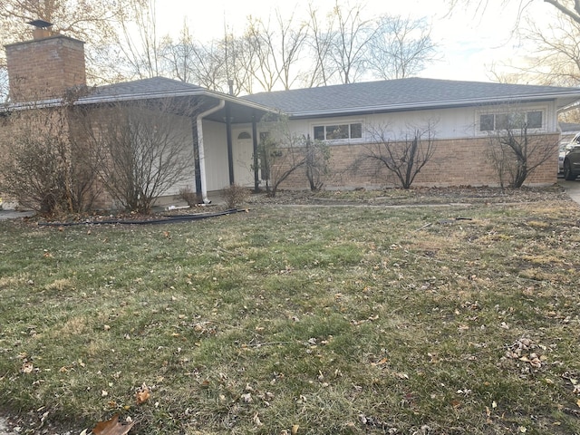 view of front of house with a front lawn