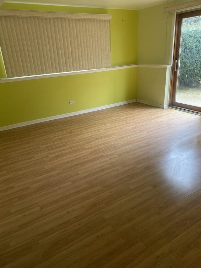 empty room featuring hardwood / wood-style floors