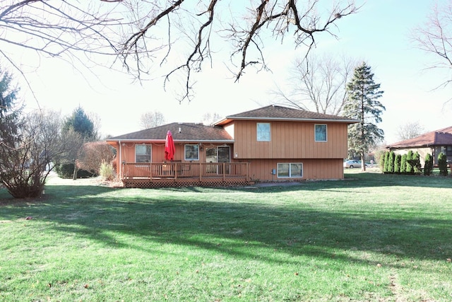 back of property featuring a yard and a deck