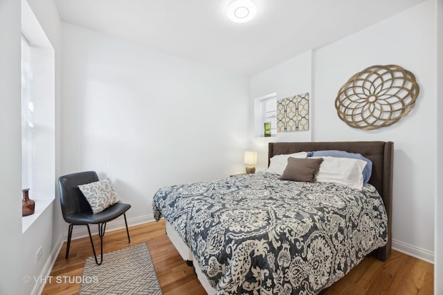 bedroom featuring wood-type flooring