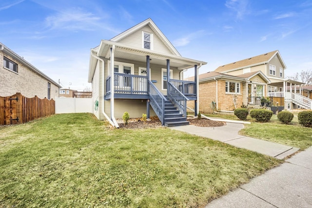 view of front facade with a porch and a front yard