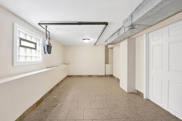 basement with light tile patterned floors