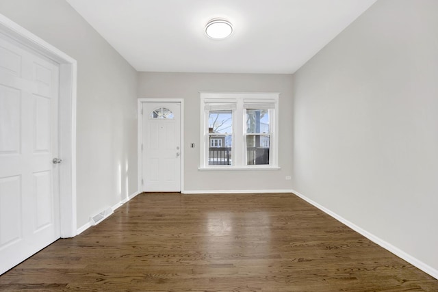 entryway featuring dark wood-type flooring