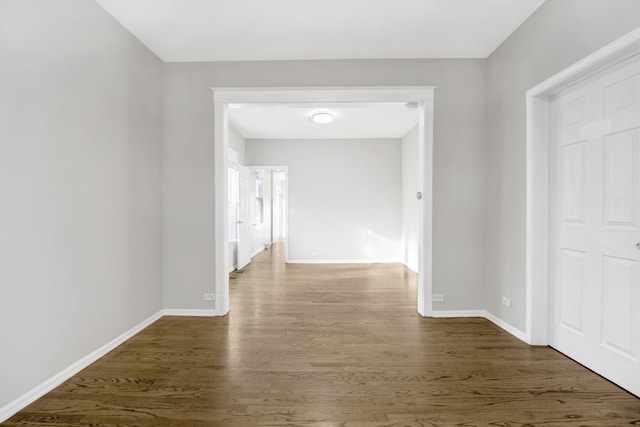 hall featuring dark wood-type flooring