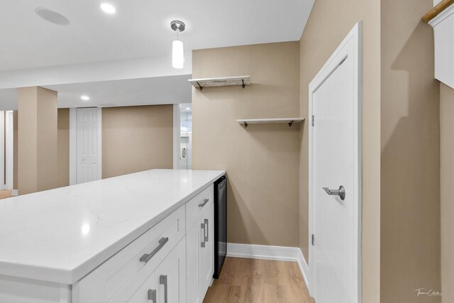 bathroom with vanity, toilet, wood-type flooring, and a shower with door