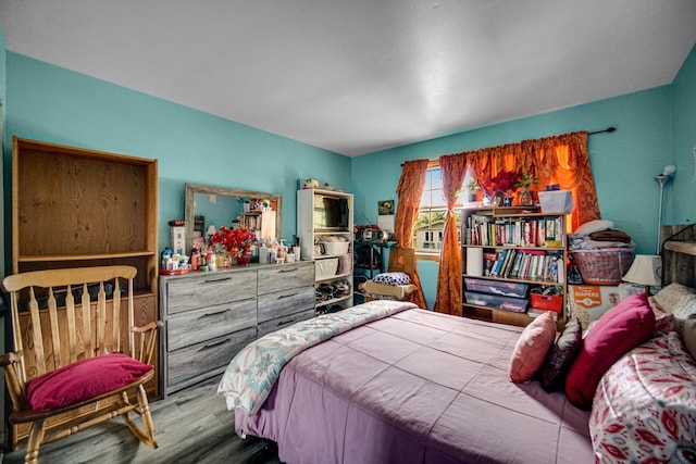 bedroom featuring light wood-type flooring