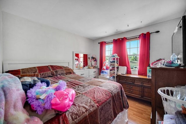 bedroom featuring light wood-type flooring