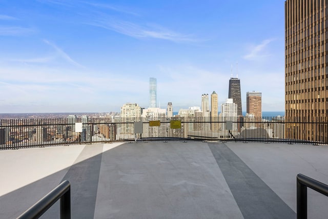 view of patio / terrace featuring a city view