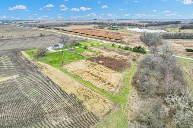 birds eye view of property with a rural view