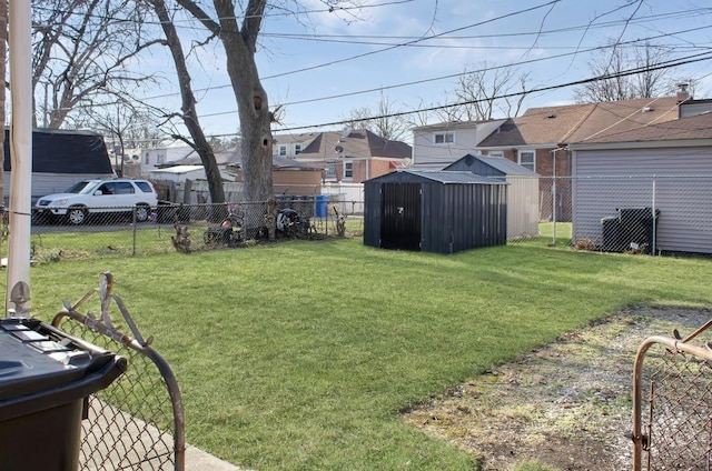 view of yard with a storage shed