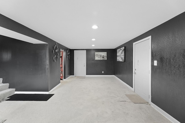 basement with light colored carpet