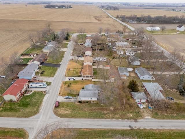 birds eye view of property with a rural view