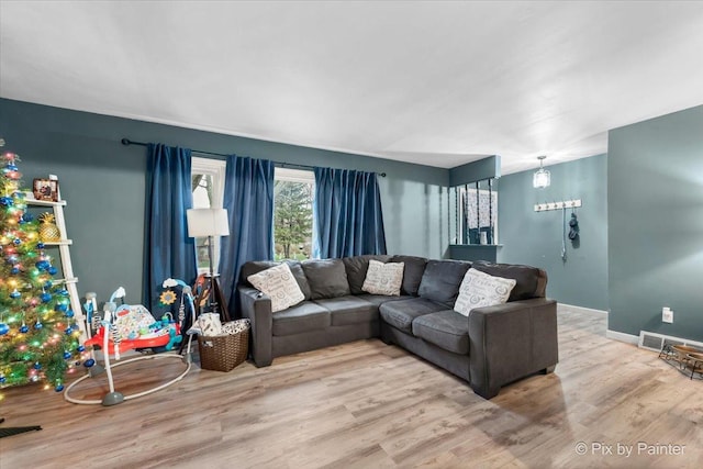 living room featuring light wood-type flooring