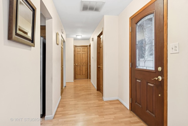 hallway featuring light hardwood / wood-style floors