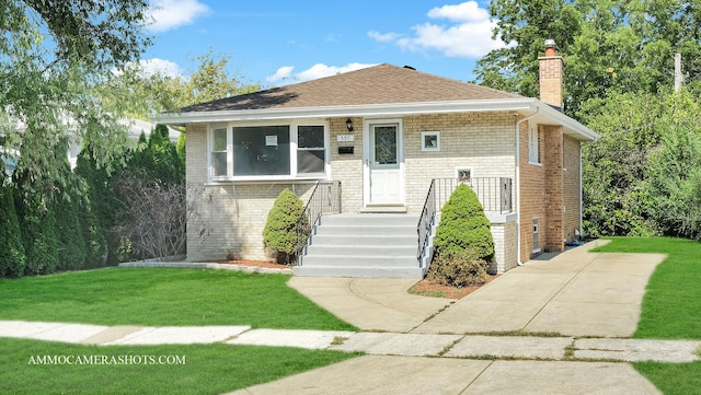 bungalow with a front lawn