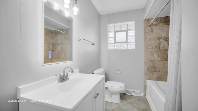 full bathroom featuring tile patterned floors, vanity, toilet, and shower / tub combo