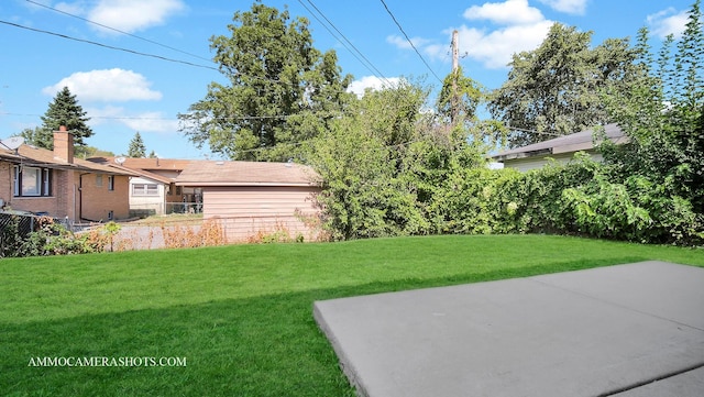 view of yard with a patio area