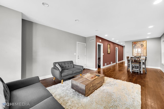 living room with dark wood-type flooring