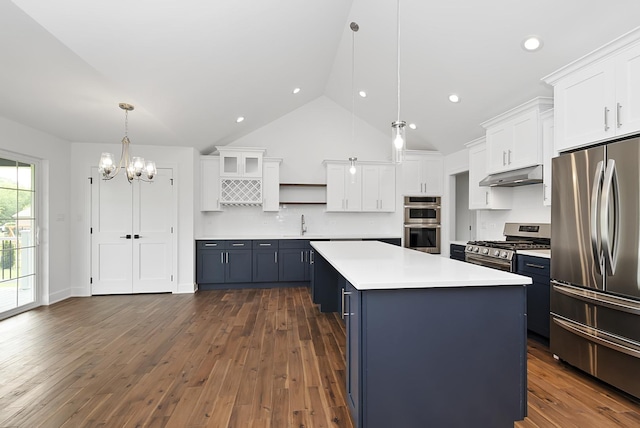 kitchen with dark wood-type flooring, white cabinets, blue cabinets, appliances with stainless steel finishes, and decorative light fixtures