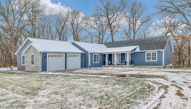 ranch-style home featuring a garage