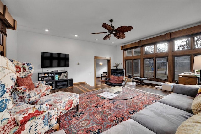 living room featuring tile patterned floors and ceiling fan