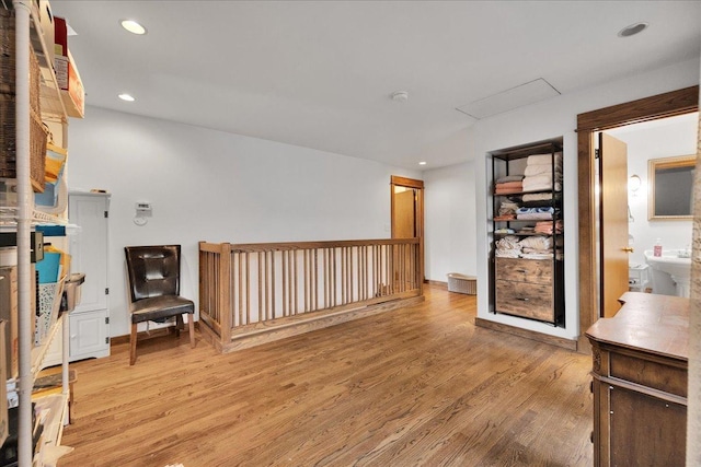 living room with light hardwood / wood-style floors